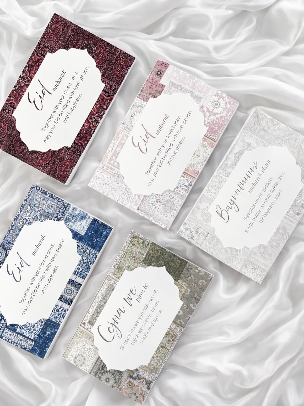 Toffifee Banderole für Zuckerfest und Bayram im orientalischen Musterdesign, verschiedene Farbvarianten mit Eid Mubarak Schriftzug, dekorative Geschenkverpackung für Toffifee 15er Packung, stilvolles mehrsprachiges Eid Präsent