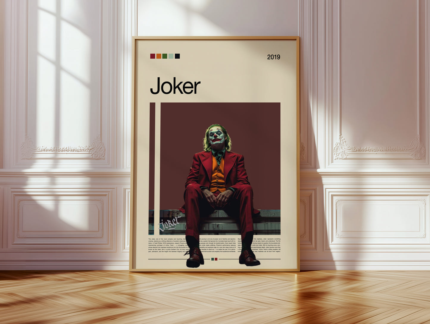 Minimalist Joker poster featuring Joaquin Phoenix in a red suit sitting under moody lighting on a dark red background. Inspired by the 2019 film Joker, this cinematic artwork captures emotion, isolation, and power – ideal for film enthusiasts and modern wall decor lovers.