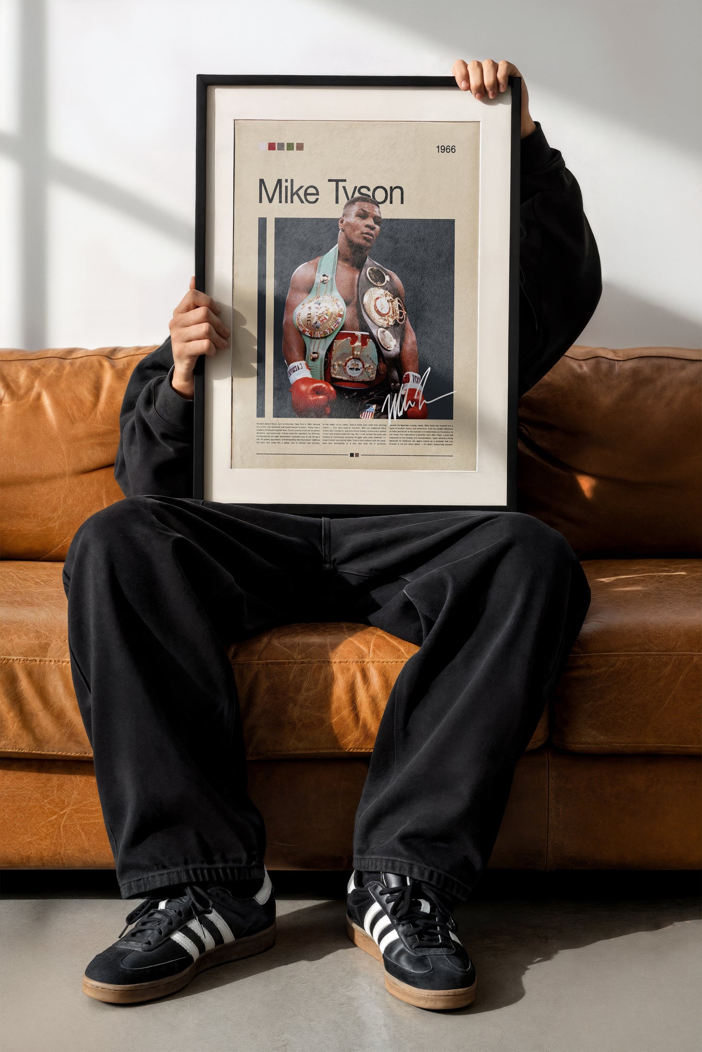 Vintage Mike Tyson poster showing the boxing legend wearing multiple championship belts. Powerful portrait of the heavyweight champion in his prime, symbolizing strength, determination, and legacy. Perfect for sports fans and collectors looking for bold, iconic wall art with a minimalist retro feel.